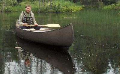 Michael in a canoe